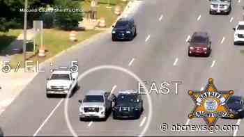 WATCH:  Michigan sheriff’s deputy climbs into driver’s truck during medical emergency