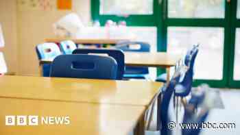 Teacher who kissed pupil on camping trip banned