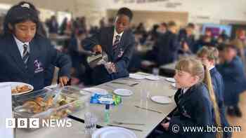 'Family dining' school scheme boosts attendance
