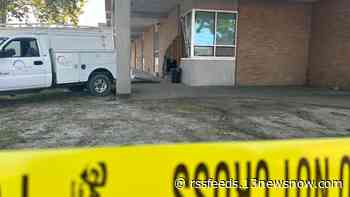 Woman injured after driving into Booker T. Washington High School