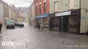 Heavy rain brings flash flooding and warning of disruption