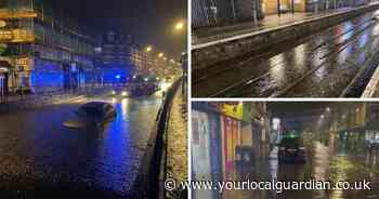 LIVE updates as firefighters rescue stranded drivers after flooding