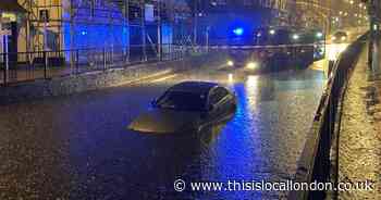 Driver rescued from car caught in flood as Wallington hit by torrential rain