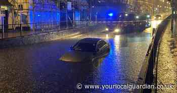 Driver rescued from car caught in flood as Wallington hit by torrential rain