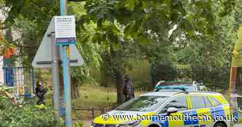 Armed police seen called to incident at former council building