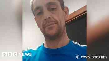 Murder charge after man found dying in alley