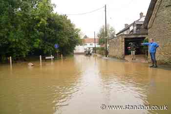 Flash floods hit parts of Britain as month’s worth of rain to fall in 24 hours