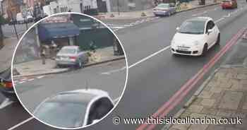 Woman taken to trauma centre after car mounts pavement in crash
