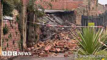 Car park wall collapses amid heavy downpours