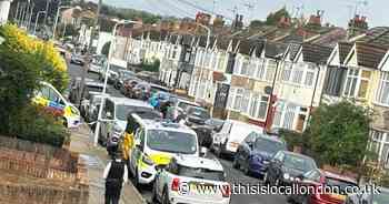 Crime scene in Romford street after dozens of police filmed in early hours