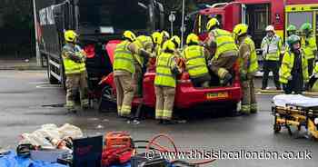 Woman trapped in car taken to hospital after crash in Tolworth