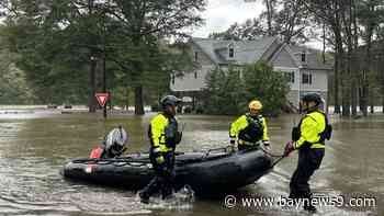 Torrential rains flood N.C. mountains and create risk of dam failure