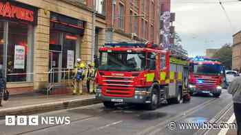 Pizza parlour fire blocks city centre road
