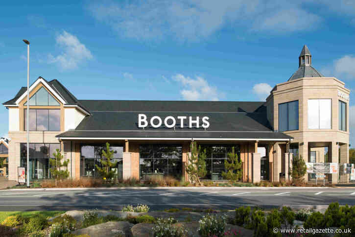 Booths cuts losses as revenues reach record levels