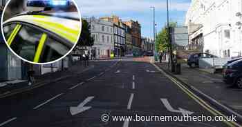 Police at scene of car crash in town centre