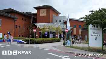 Surgeon suspended for touching junior colleague