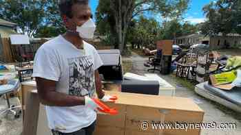 Debris from Helene piled up along roadways in south St. Pete's Coquina Key