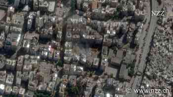 AUS DEM ORBIT - Der Schauplatz der Tötung Nasrallahs: Zerstörte Gebäude, Rauchwolken und ein gigantischer Krater