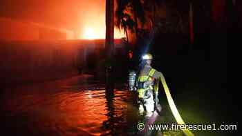 Photo of the Week: Fla. firefighters face fire during flooding