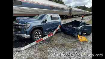 Train crashes into pickup truck stuck on tracks in New Kent County