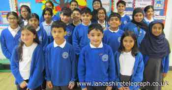'Reading buddies' scheme hailed a success by pupils