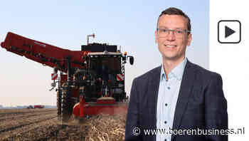 Oogsttrein op stoom, markt tegen de stootblokken