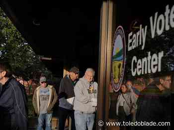 Voters line up to cast ballots on 1st day of early voting