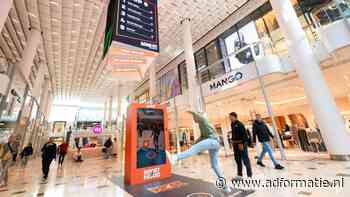 Basic-Fit laat winkelpubliek sporten voor een slim scherm