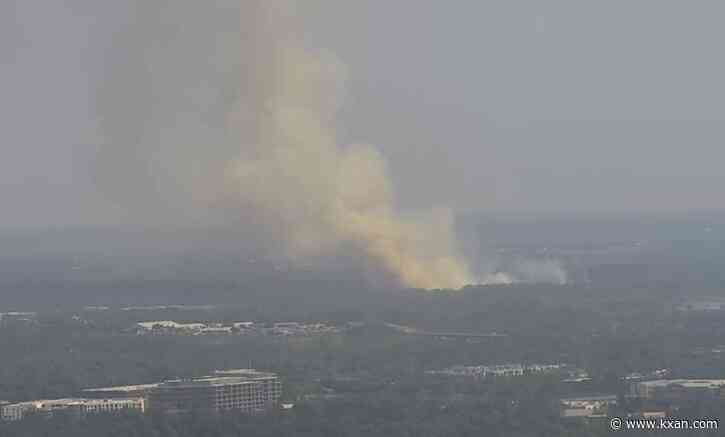 AFD slows brush fire previously threatening structures in east Austin