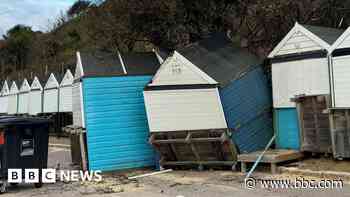 Landslip hits beach huts after heavy rainfall