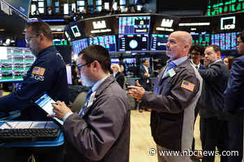 Dow jumps 400 points to a record on Friday, S&P 500 closes above 5,800 for the first time