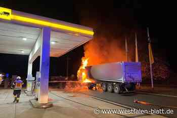 LKW steht neben einer Tankstelle in Flammen