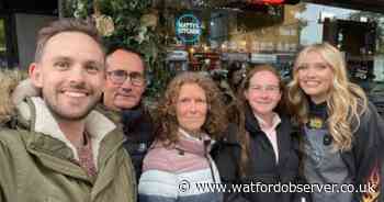Fans delighted as Ella Henderson performs at bakery... and hands out cookies