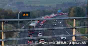 Motorway 'partially blocked' and 'traffic queueing' due to crash