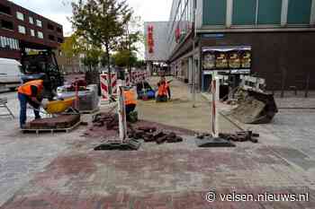 Nieuwe tegels voor IJmuidense Lange Nieuwstraat