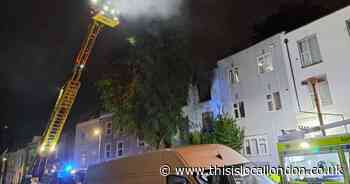 Police investigation launched as man taken to hospital after Woolwich flat fire