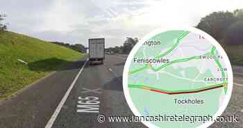 Motorway closed for several hours due to van tipping over