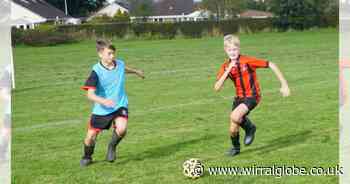 Wirral football club's kickabout in wellies to raise awareness of climate change