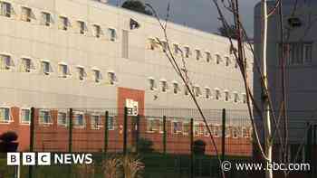Inmate died after being found on toilet - inquest
