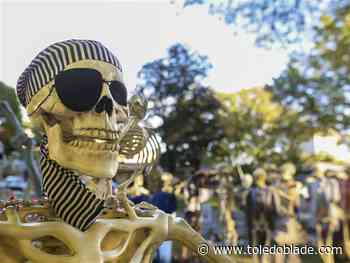 2 Toledo homes decked out in skeletons for cancer fund-raiser