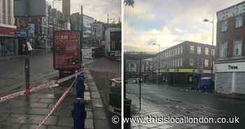 Multiple cordons in place with blue tent erected after man stabbed in Lewisham