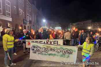 Fakkels tonen solidariteit met mensen in armoede