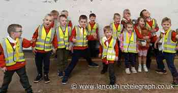 Scouts group given high-visibility vests by Specsavers