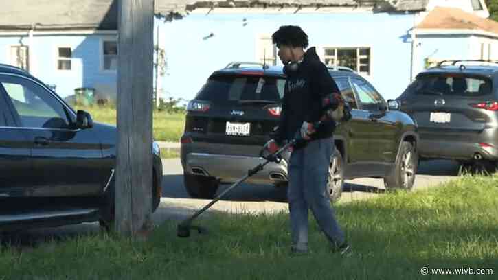 McKinley High School students volunteer to clean up property on Clinton Street