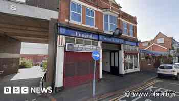 Children arrested after funeral car set on fire