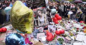 Hundreds of heartbroken One Direction fans gather in London to remember Liam Payne