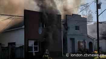 'He's a hero': Father runs into burning home and emerges with two infant children