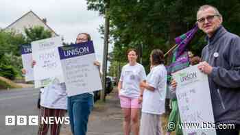 Striking hospital staff to march over jobs row