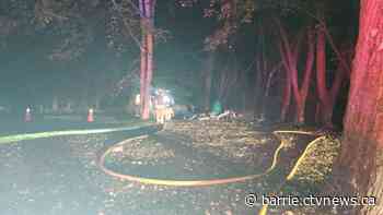 Mobile trailer destroyed in fire caused by a candle