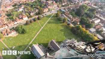 Changing the bulb on UK's tallest cathedral spire